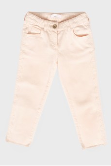 Детские розовые джинсы
