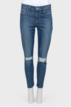 Jeans with decorative cuts