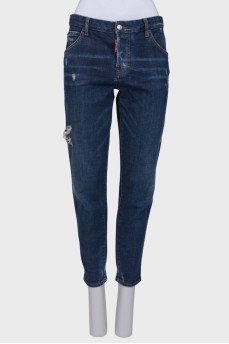 Светло-синие джинсы с эффектом рваных и потертых