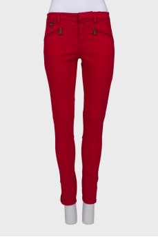Червоні джинси з кишенями на блискавці
