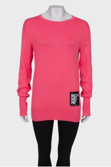 Рожевий светр із нашивками