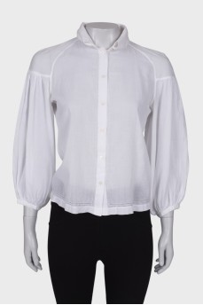 Біла блузка з об'ємними рукавами