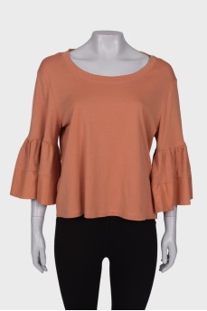 Персиковая блуза с широкими рукавами