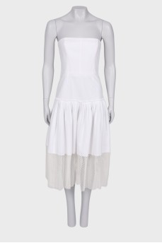 Біла сукня з плісированим подолом