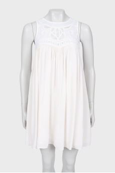 Біла сукня з візерунком А-силуету