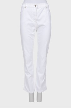 Білі джинси із золотистою фурнітурою