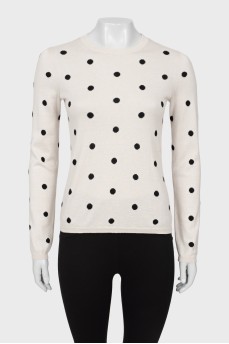 Чорно-білий светр у горошок