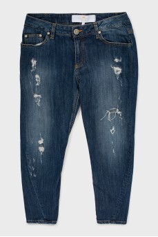 Темно-синие джинсы с потертым эффектом