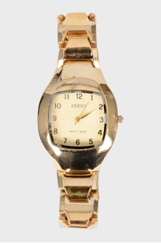 Золотистий наручний годинник