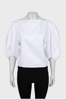 Біла блуза з рельєфними швами