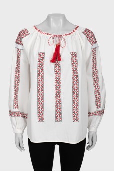 Блуза з широкими рукавами декорована вишивкою