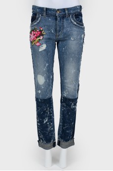 Двоколірні джинси з вишивкою