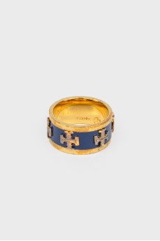 Золота каблучка з вставкою синього кольору.