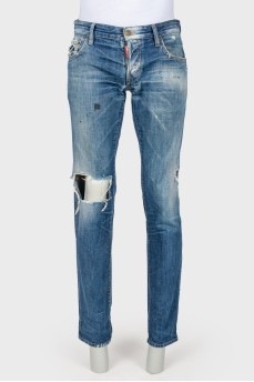 Мужские джинсы с эффектом рваных и потертых с краской