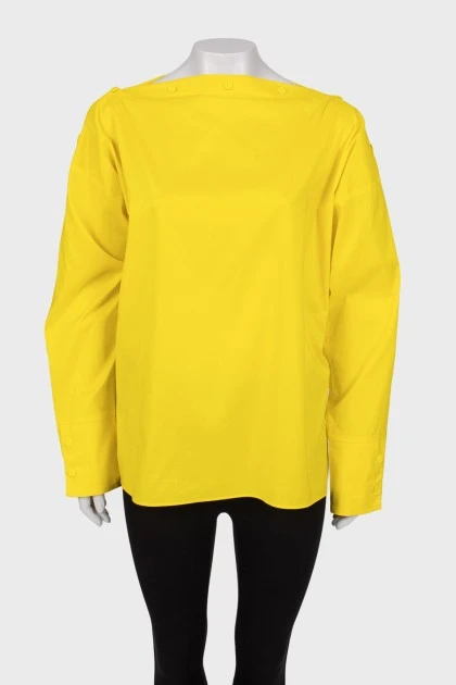 Желтая блуза на заклепках
