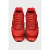 Червоні кросівки із замшевими вставками