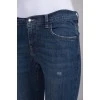 Блакитні джинси з ефектом рваних та потертих