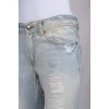 Світло-блакитні джинси з ефектом рваних та потертих