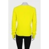Вовняний жовтий светр з написом