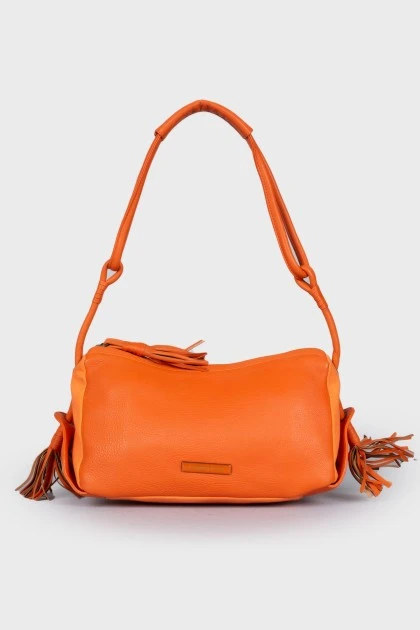Шкіряна помаранчева сумка з пензликами