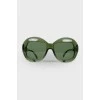 Зелені сонцезахисні окуляри