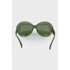 Зелені сонцезахисні окуляри