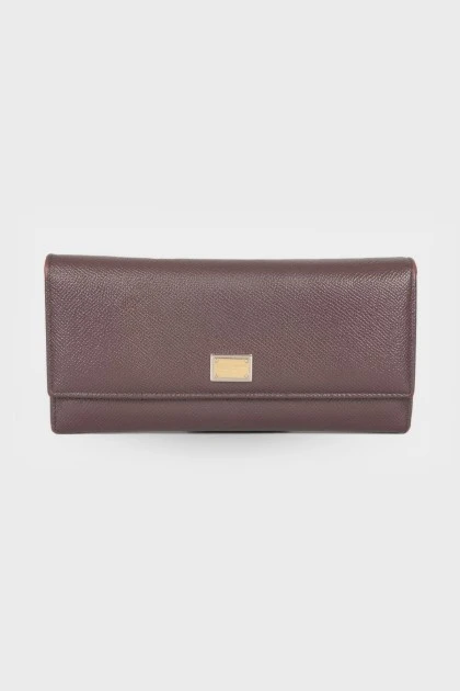 Шкіряний гаманець темно-бордового кольору