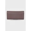 Шкіряний гаманець темно-бордового кольору