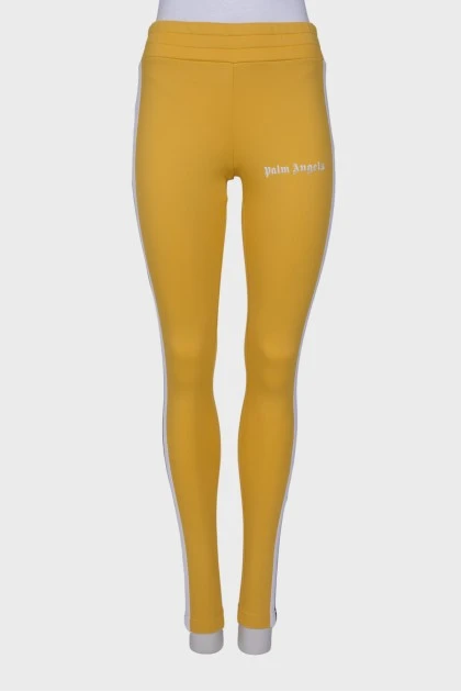 Спортивные брюки желтого цвета 
