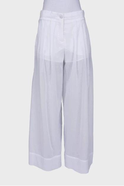 Полупрозрачные брюки белого цвета 