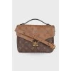 Сумка Pochette Métis Reverse