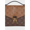 Сумка Pochette Métis Reverse