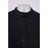 Чорна блуза зі складками на грудях