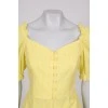 Жовтий костюм блуза та спідниця