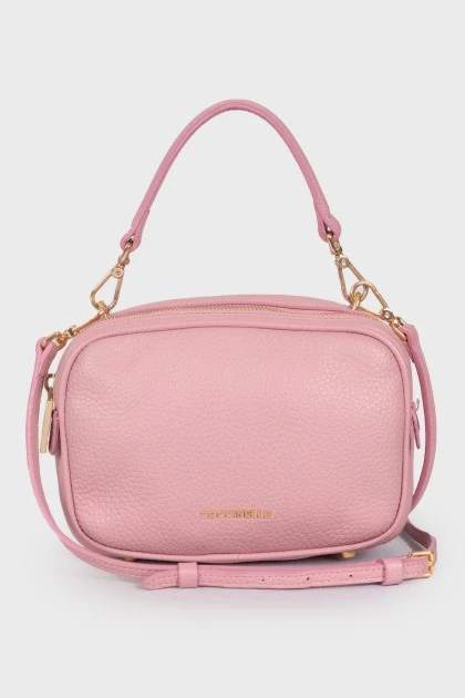 Кожаная розовая сумка на ремешке