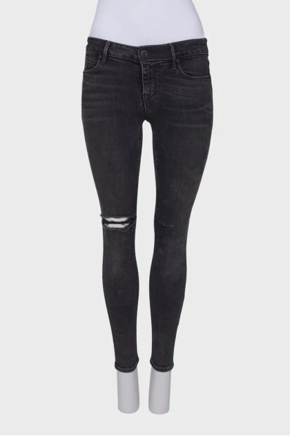 Черно-серые джинсы с эффектом рваных
