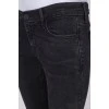 Черно-серые джинсы с эффектом рваных
