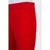 Красные брюки с карманами 