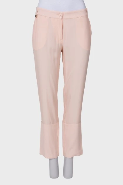 Розовые брюки с карманами