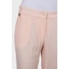 Розовые брюки с карманами
