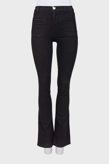 Черные джинсы с карманами 