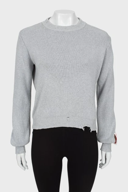 Сірий светр з рваним ефектом