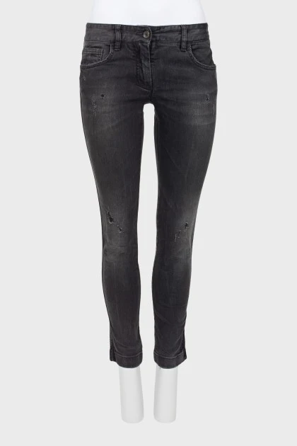 Черные джинсы с потертым эффектом
