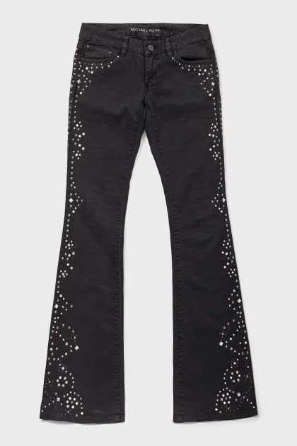 Черные джинсы с металлическими стразами 
