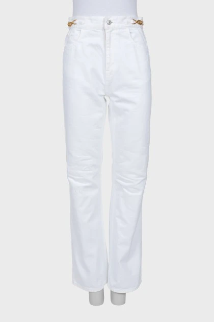 Белые джинсы с золотистым декором 