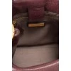 Кожаная сумка-ведро с золотистой фурнитурой