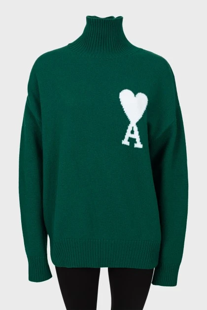 Вязаный зеленый свитер из шерсти
