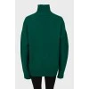 В'язаний зелений светр із вовни