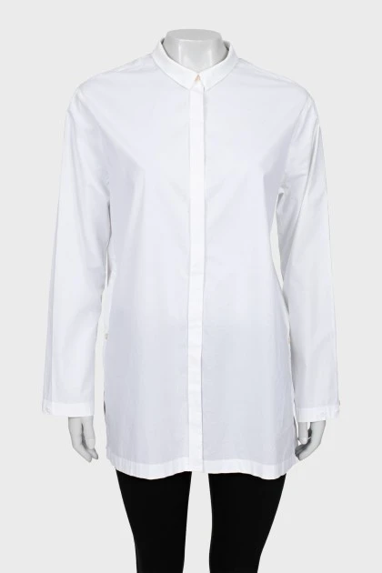 Біла сорочка з розрізами з боків