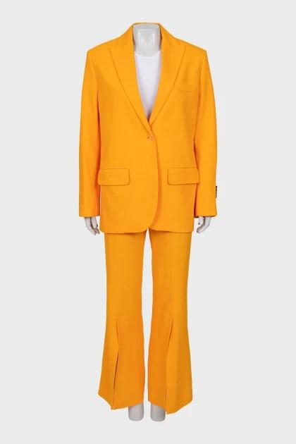 Костюм із брюками оранжевого кольору
